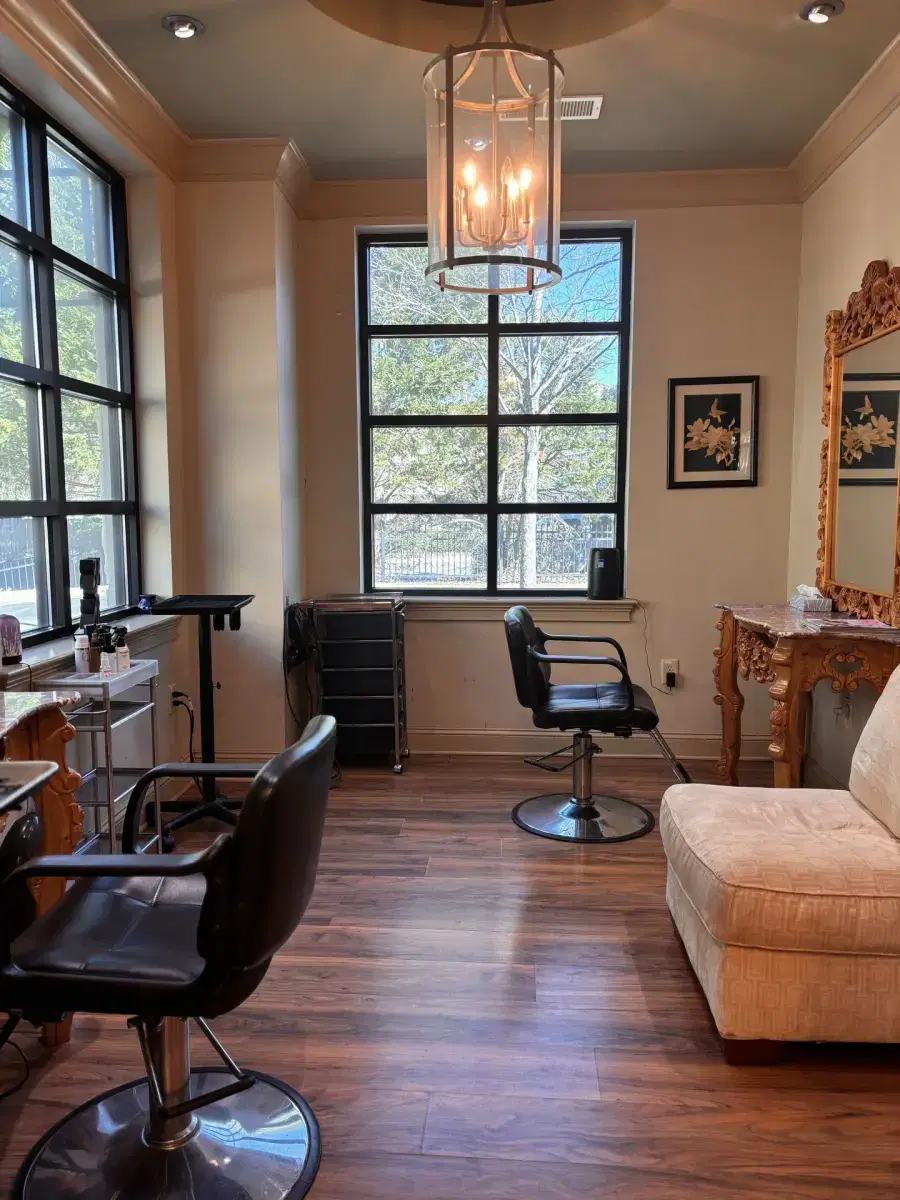 Premium private salon suite interior with chandelier